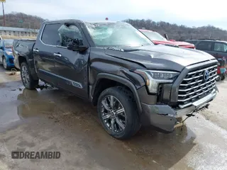 2022 Toyota Tundra Capstone Hybrid with VIN 5TFVC5DB6NX005465, listed as a IAAI auction lot 41589222 with 28,452 mi miles and . Bid and sale history available at DreamBid. Image 1.
