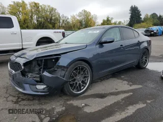 2014 Kia Cadenza Premium with VIN KNALN4D75E5123328, listed as a Copart auction lot 77590774 with 70,414 mi miles and Salvage Title. Bid and sale history available at carsss.com. Image 1.