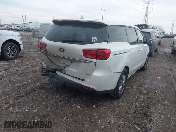 2021 Kia Sedona LX with VIN KNDMB5C19M6662112, listed as a IAAI auction lot 41684140 with 57,874 mi miles. Bid and sale history available at carsss.com. Image 4.