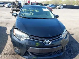2015 Toyota Corolla L with VIN 2T1BURHE0FC468813, listed as a IAAI auction lot 42053015 with 202,524 mi miles and . Bid and sale history available at DreamBid. Image 12.