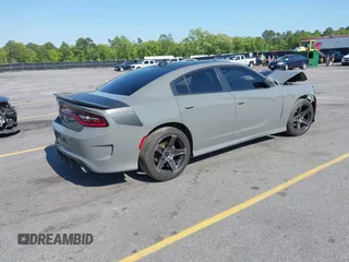 2017 Dodge Charger R/T with VIN 2C3CDXCT6HH595433, listed as a IAAI auction lot 42034429 with 123,512 mi miles and . Bid and sale history available at DreamBid. Image 4.