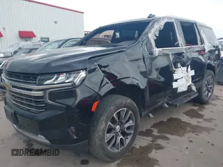 2021 Chevrolet Tahoe LT z VIN 1GNSCNKD5MR282271, wystawiony jako IAAI lot #42705493 z przebiegiem 68 280 mil mil oraz . Historia ofert i sprzedaży dostępna na DreamBid. Obrazek 2.
