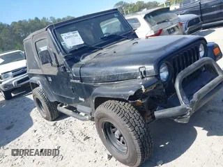 2000 Jeep Wrangler SE z VIN 1J4FA29P9YP756586, wystawiony jako IAAI lot #42053320 z przebiegiem 168 753 mil mil oraz . Historia ofert i sprzedaży dostępna na DreamBid. Obrazek 1.