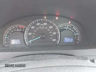 2014 Toyota Camry L with VIN 4T4BF1FK1ER424875, listed as a IAAI auction lot 42025877 with 113,919 mi miles. Bid and sale history available at carsss.com. Image 7.
