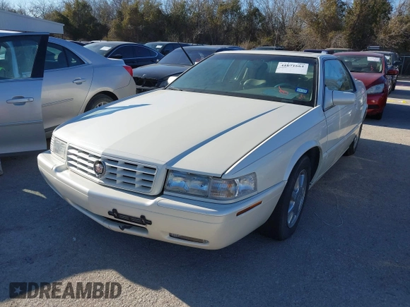 2000 Cadillac Eldorado Touring ETC z VIN 1G6ET1292YU188056, wystawiony jako IAAI lot #41671661 z przebiegiem 139 138 mil mil oraz . Historia ofert i sprzedaży dostępna na DreamBid. Obrazek 2.