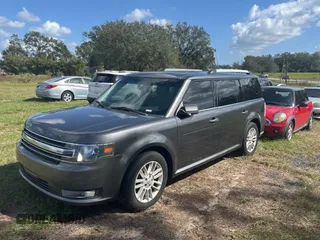 2016 Ford Flex SEL z VIN 2FMGK5C83GBA09724, wystawiony jako Copart lot #80993314 z przebiegiem 188 103 mil mil oraz Czysty tytuł • Clean title. Historia ofert i sprzedaży dostępna na DreamBid. Obrazek 2.