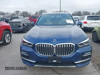 2020 BMW X5 sDrive40i with VIN 5UXCR4C07L9C27998, listed as a IAAI auction lot 41652088 with 59,009 mi miles and . Bid and sale history available at DreamBid. Image 13.