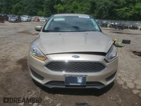 2018 Ford Focus SE with VIN 1FADP3F28JL292624, listed as a Copart auction lot 58960775 with 99,385 mi miles and Salvage title. Bid and sale history available at DreamBid. Image 5.