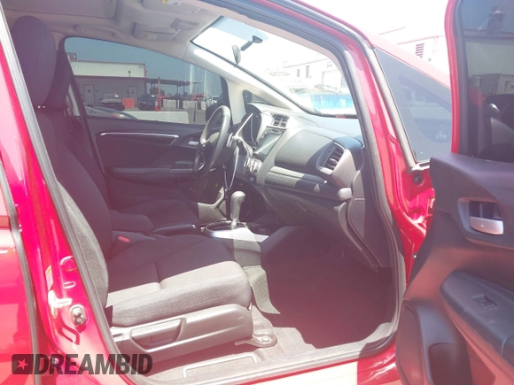 2015 Honda Fit EX-L z VIN 3HGGK5H84FM742893, wystawiony jako IAAI lot #42272487 z przebiegiem 84 942 mil mil oraz . Historia ofert i sprzedaży dostępna na DreamBid. Obrazek 5.
