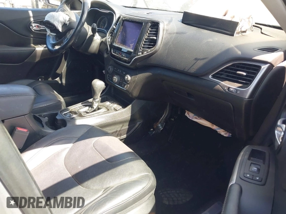 2021 Jeep Cherokee Limited with VIN 1C4PJLDX0MD100067, listed as a IAAI auction lot 42273029 with 84,579 mi miles and . Bid and sale history available at DreamBid. Image 5.