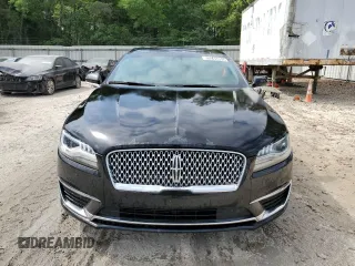2019 Lincoln MKZ Reserve II z VIN 3LN6L5E98KR617764, wystawiony jako Copart lot #53246005 z przebiegiem 108 017 mil mil oraz Tytuł czysty. Historia ofert i sprzedaży dostępna na DreamBid. Obrazek 5.