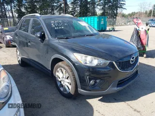 2015 Mazda CX-5 Touring with VIN JM3KE4CY0F0545005, listed as a IAAI auction lot 41697375 with 211,821 mi miles. Bid and sale history available at carsss.com. Image 1.