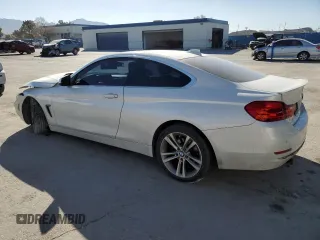 2016 BMW 4 Series 428i with VIN WBA3N7C57GK226143, listed as a Copart auction lot 44036805 with 117,218 mi miles and Salvage Title. Bid and sale history available at carsss.com. Image 2.