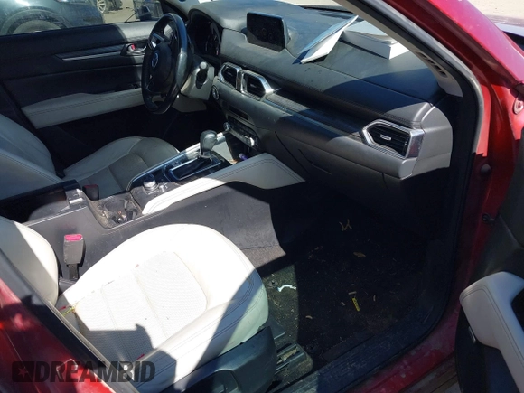 2020 Mazda CX-5 Grand Touring with VIN JM3KFADM3L0761286, listed as a IAAI auction lot 41715379 with 145,656 mi miles and . Bid and sale history available at DreamBid. Image 5.