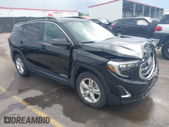 2021 GMC Terrain SLE z VIN 3GKALTEV5ML345992, wystawiony jako IAAI lot #42467280 z przebiegiem 123 704 mil mil oraz . Historia ofert i sprzedaży dostępna na DreamBid. Obrazek 1.