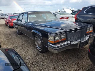 1989 Cadillac Brougham z VIN 1G6DW51Y6KR723841, wystawiony jako Copart lot #74548864 z przebiegiem 74 705 mil mil oraz Szkody całkowita. Historia ofert i sprzedaży dostępna na DreamBid. Obrazek 4.