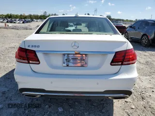 2014 Mercedes-Benz E 350 Sport with VIN WDDHF5KB8EA828799, listed as a Copart auction lot 52600805 with 113,755 mi miles and Salvage Title. Bid and sale history available at DreamBid. Image 6.