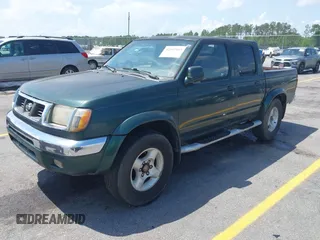 2000 Nissan Frontier XE with VIN 1N6ED27T2YC353126, listed as a IAAI auction lot 42092445 with 189,992 mi miles and . Bid and sale history available at DreamBid. Image 2.