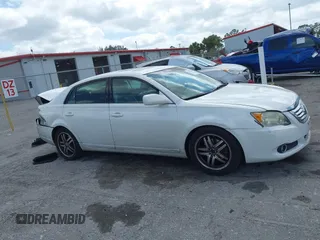 2009 Toyota Avalon XL with VIN 4T1BK36BX9U326841, listed as a IAAI auction lot 42156100 with 166,999 mi miles and . Bid and sale history available at DreamBid. Image 13.