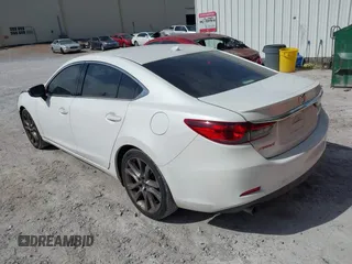 2015 Mazda 6 i Grand Touring with VIN JM1GJ1W50F1204322, listed as a IAAI auction lot 40694216 with 141,357 mi miles. Bid and sale history available at carsss.com. Image 3.