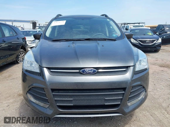 2016 Ford Escape SE with VIN 1FMCU9GX8GUB42944, listed as a IAAI auction lot 42171770 with 120,041 mi miles. Bid and sale history available at carsss.com. Image 12.
