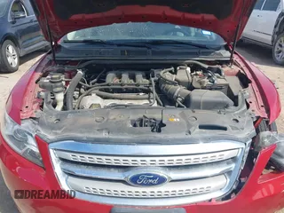 2011 Ford Taurus SEL z VIN 1FAHP2EW7BG123740, wystawiony jako IAAI lot #41890761 z przebiegiem 132 310 mil mil oraz . Historia ofert i sprzedaży dostępna na DreamBid. Obrazek 10.