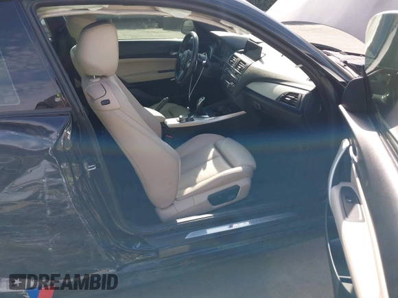 2015 BMW 2 Series M235i with VIN WBA1J7C55FV358964, listed as a IAAI auction lot 41674800 with 63,504 mi miles and . Bid and sale history available at carsss.com. Image 5.