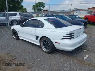 1994 Ford Mustang GT z VIN 1FALP42T0RF155834, wystawiony jako IAAI lot #42698515 z przebiegiem 146 338 mil mil oraz . Historia ofert i sprzedaży dostępna na DreamBid. Obrazek 3.