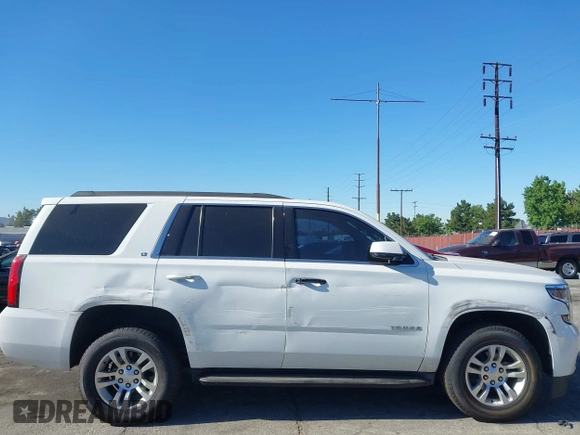 2020 Chevrolet Tahoe LT with VIN 1GNSCBKC0LR195687, listed as a IAAI auction lot 42620344 with 48,059 mi miles and . Bid and sale history available at DreamBid. Image 6.