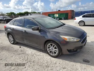 2018 Ford Focus SE with VIN 1FADP3F21JL298832, listed as a Copart auction lot 61262655 with 122,331 mi miles and Clean title. Bid and sale history available at DreamBid. Image 4.
