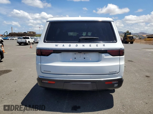 2022 Jeep Wagoneer Series II z VIN 1C4SJVBTXNS211440, wystawiony jako Copart lot #65639735 z przebiegiem 26 672 mil mil oraz Czysty tytuł • Clean title. Historia ofert i sprzedaży dostępna na DreamBid. Obrazek 6.
