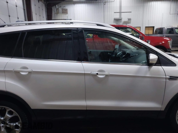 2013 Ford Escape Titanium с VIN 1FMCU9J96DUD54201, выставлен на аукционе IAAI как лот 42075287 с пробегом 147 923 миль миль и . История ставок и продаж доступна на DreamBid. Изображение 14.