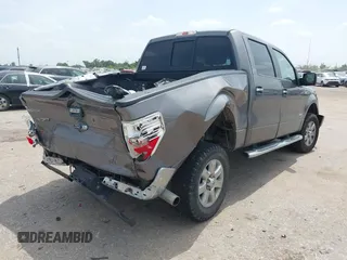 2014 Ford F-150 XL with VIN 1FTFW1CT6EKE47108, listed as a IAAI auction lot 42647142 with 73,827 mi miles and . Bid and sale history available at DreamBid. Image 4.