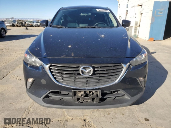 2017 Mazda CX-3 Touring z VIN JM1DKDC74H0165654, wystawiony jako Copart lot #41928295 z przebiegiem 173 567 mil mil oraz Szkoda całkowita • Salvage title. Historia ofert i sprzedaży dostępna na DreamBid. Obrazek 5.