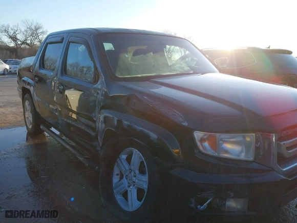 2009 Honda Ridgeline RTL with VIN 5FPYK16569B099998, listed as a IAAI auction lot 41403995 with 189,146 mi miles. Bid and sale history available at carsss.com. Image 6.