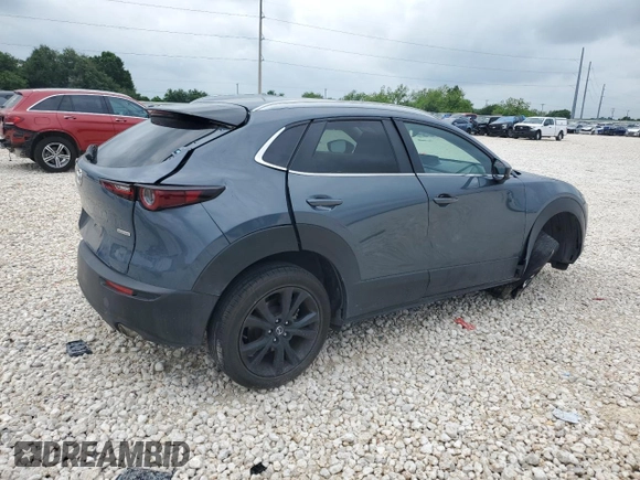 2023 Mazda CX-30 S Carbon Edition z VIN 3MVDMBCM2PM539130, wystawiony jako Copart lot #54817735 z przebiegiem 29 678 mil mil oraz Szkoda całkowita • Salvage title. Historia ofert i sprzedaży dostępna na DreamBid. Obrazek 3.