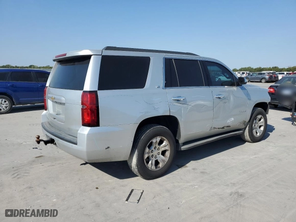 2015 Chevrolet Tahoe LS with VIN 1GNSKAKC3FR245127, listed as a Copart auction lot 74401204 with 160,179 mi miles and Salvage Title. Bid and sale history available at carsss.com. Image 3.