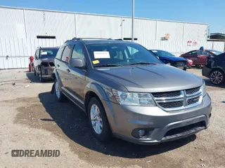 2013 Dodge Journey SXT with VIN 3C4PDDBGXDT650886, listed as a IAAI auction lot 41864331 with 224,579 mi miles and . Bid and sale history available at DreamBid. Image 1.