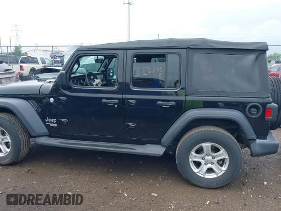 2018 Jeep Wrangler Unlimited Sport S with VIN 1C4HJXDG3JW150232, listed as a IAAI auction lot 42379385 with 60,679 mi miles and . Bid and sale history available at DreamBid. Image 14.