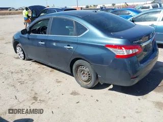 2015 Nissan Sentra SV with VIN 3N1AB7AP9FL688596, listed as a IAAI auction lot 42082292 with 77,300 mi miles and . Bid and sale history available at DreamBid. Image 3.