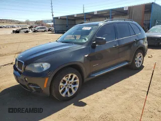 2011 BMW X5 35i with VIN 5UXZV4C54BL404460, listed as a Copart auction lot 50574755 with 119,808 mi miles and Salvage Title. Bid and sale history available at carsss.com. Image 1.
