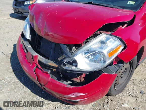 2009 Nissan Versa S with VIN 3N1BC11E39L406700, listed as a IAAI auction lot 41854737 with 186,937 mi miles and . Bid and sale history available at DreamBid. Image 6.