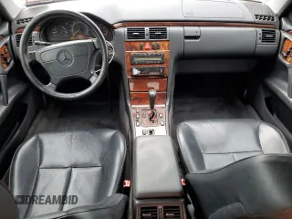 1999 Mercedes-Benz E-Class with VIN WDBJF65H4XA883351, listed as a Copart auction lot 73682964 with 156,446 mi miles and Salvage Title. Bid and sale history available at carsss.com. Image 8.