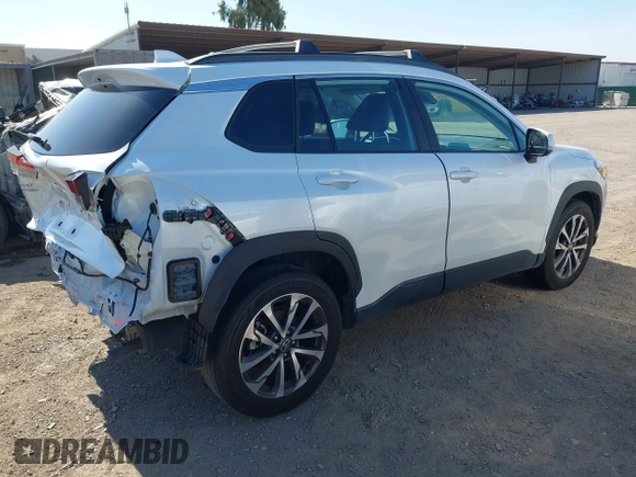 2022 Toyota Corolla Cross XLE with VIN 7MUEAAAG4NV027314, listed as a IAAI auction lot 42701907 with 30,275 mi miles and . Bid and sale history available at DreamBid. Image 4.