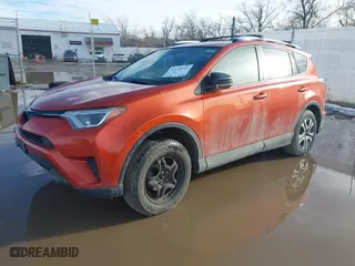 2016 Toyota RAV4 LE with VIN JTMBFREVXGJ081156, listed as a IAAI auction lot 41648303 with 74,087 mi miles. Bid and sale history available at carsss.com. Image 17.