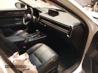 2023 Mazda CX-50 S Premium Plus with VIN 7MMVABEMXPN139186, listed as a IAAI auction lot 41289690 with 26,556 mi miles and . Bid and sale history available at DreamBid. Image 5.