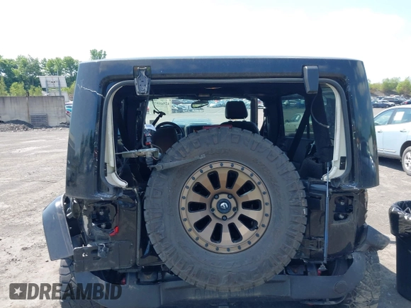 2017 Jeep Wrangler Unlimited Rubicon Recon with VIN 1C4BJWFG7HL525709, listed as a IAAI auction lot 42569577 with 119,560 mi miles and . Bid and sale history available at DreamBid. Image 6.