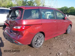 2012 Mazda 5 Grand Touring with VIN JM1CW2DL5C0134521, listed as a IAAI auction lot 42138375 with 227,485 mi miles and . Bid and sale history available at DreamBid. Image 4.
