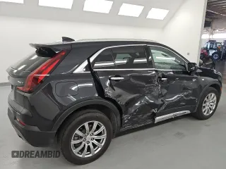 2023 Cadillac XT4 AWD Premium Luxury z VIN 1GYFZDR42PF174473, wystawiony jako Copart lot #55953305 z przebiegiem 42 268 mil mil oraz Szkoda całkowita • Salvage title. Historia ofert i sprzedaży dostępna na DreamBid. Obrazek 3.