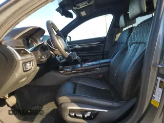 2017 BMW 7 Series 740i with VIN WBA7E2C32HG740988, listed as a Copart auction lot 49613465 with 63,646 mi miles and Salvage Title. Bid and sale history available at carsss.com. Image 7.